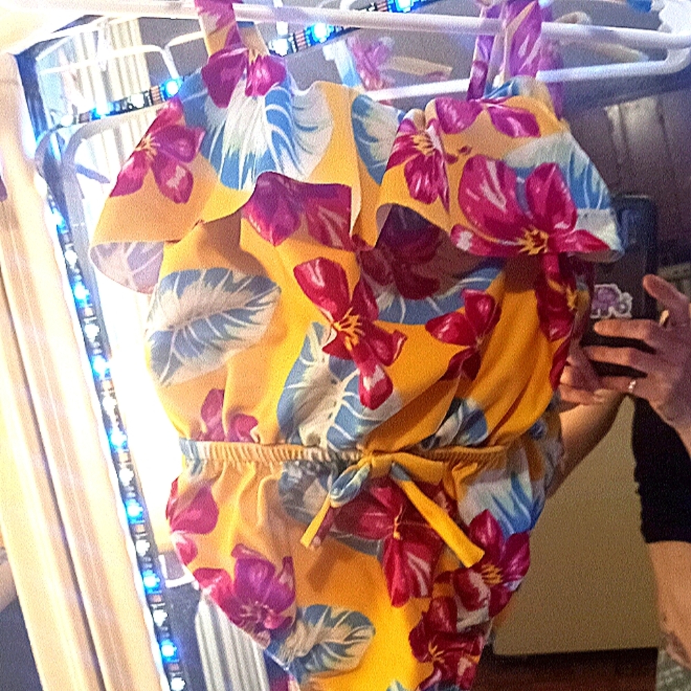 A beautiful pink and yellow floral bathing suit for 12 month old